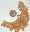 100 6mm Bicone Topaz AB